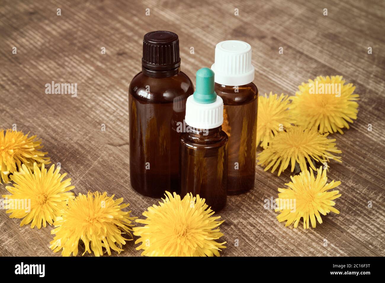 Dandelion extract in a small bottles Stock Photo Alamy