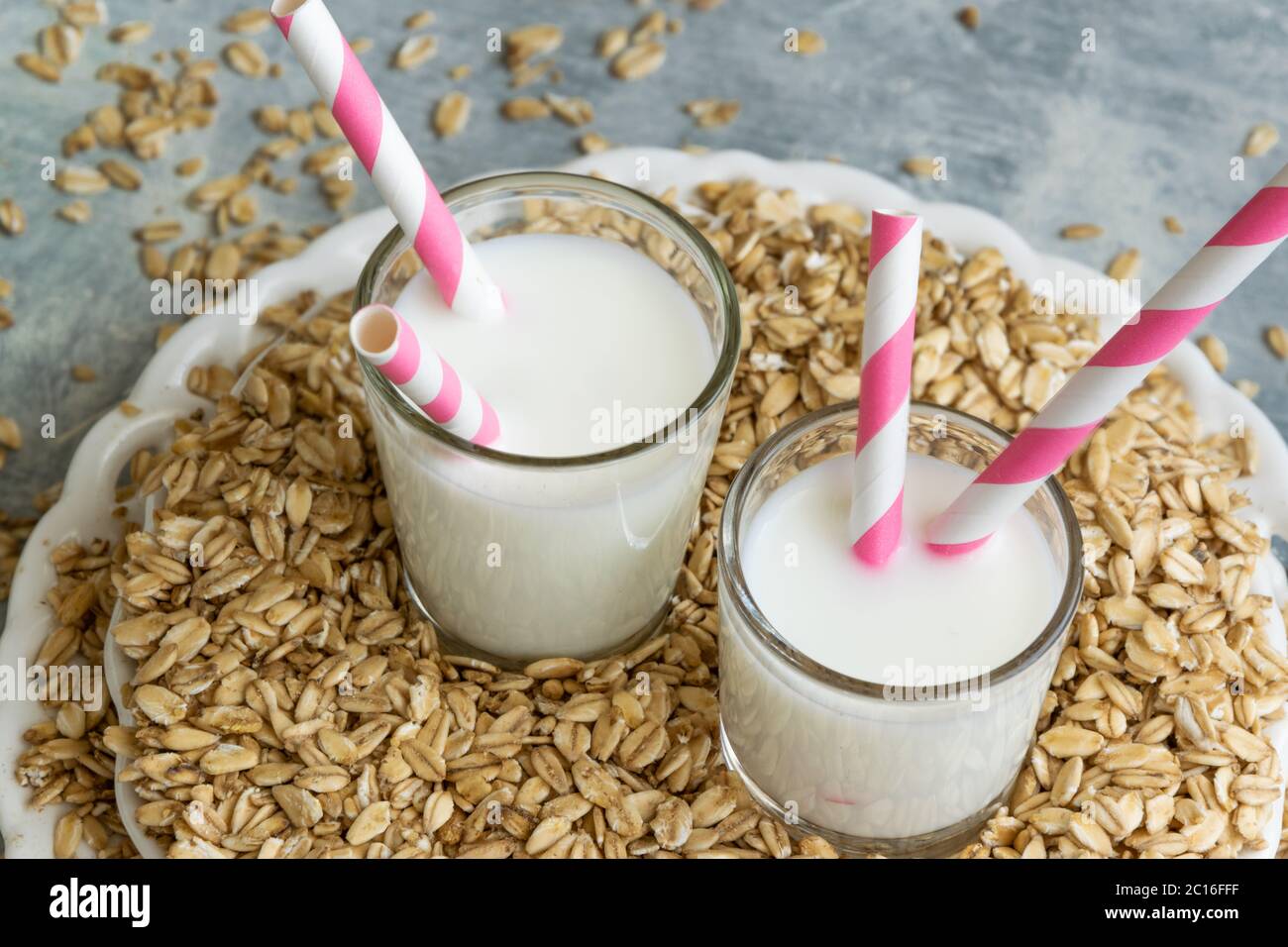 Fresh oat milk drink. Healthy nutritional ingredient, dairy themes