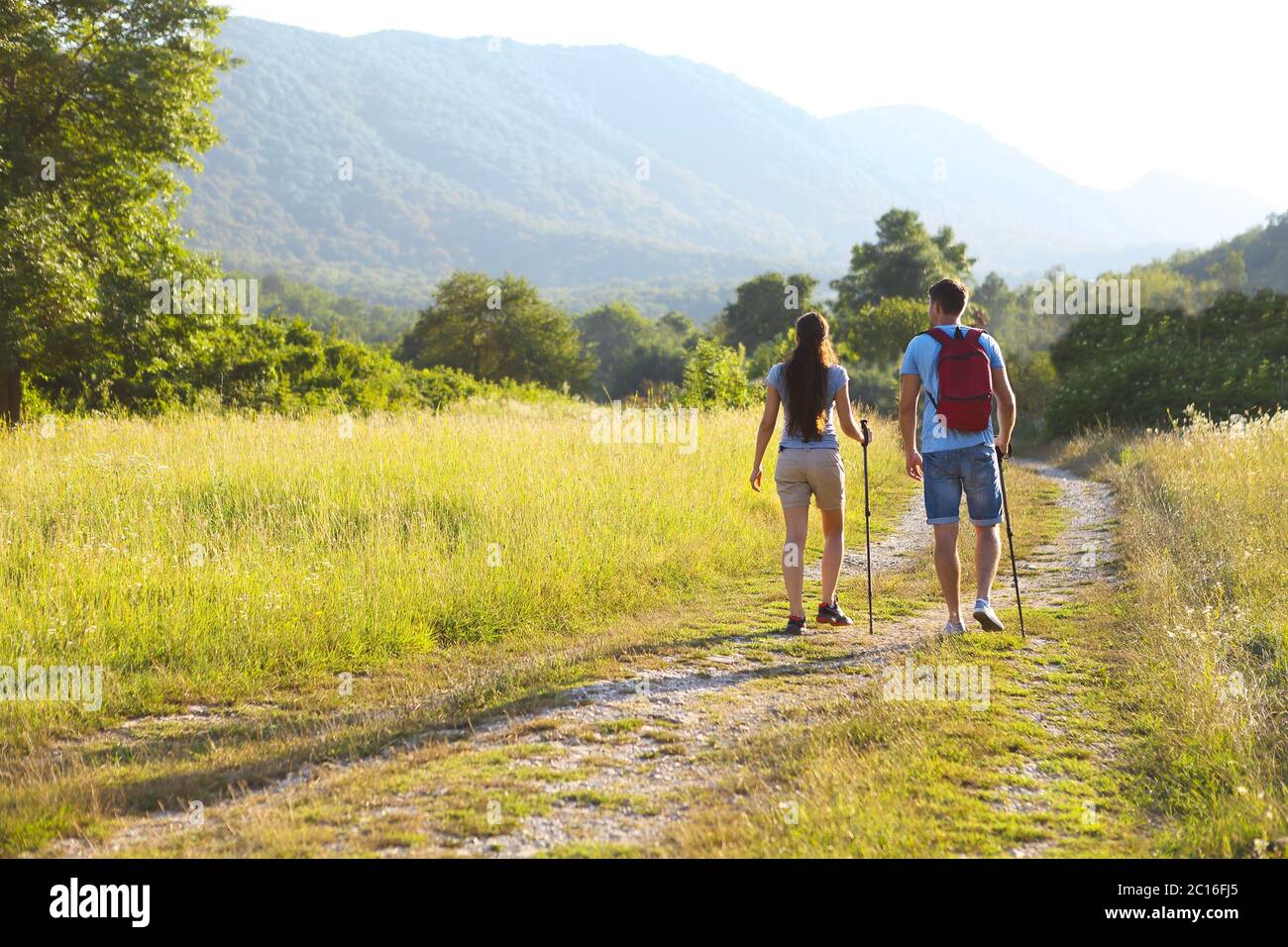 Woman man hiking field hi-res stock photography and images - Alamy