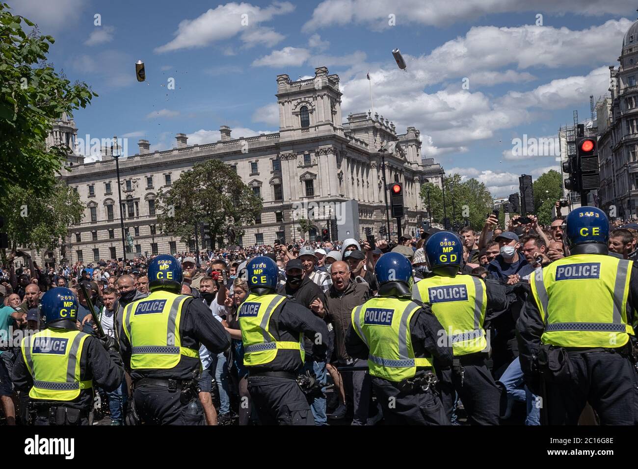 Thousands of nationalists gather in Westminster to violently protest against the recent removal and vandalism of monuments, notably Winston Churchill. Stock Photo