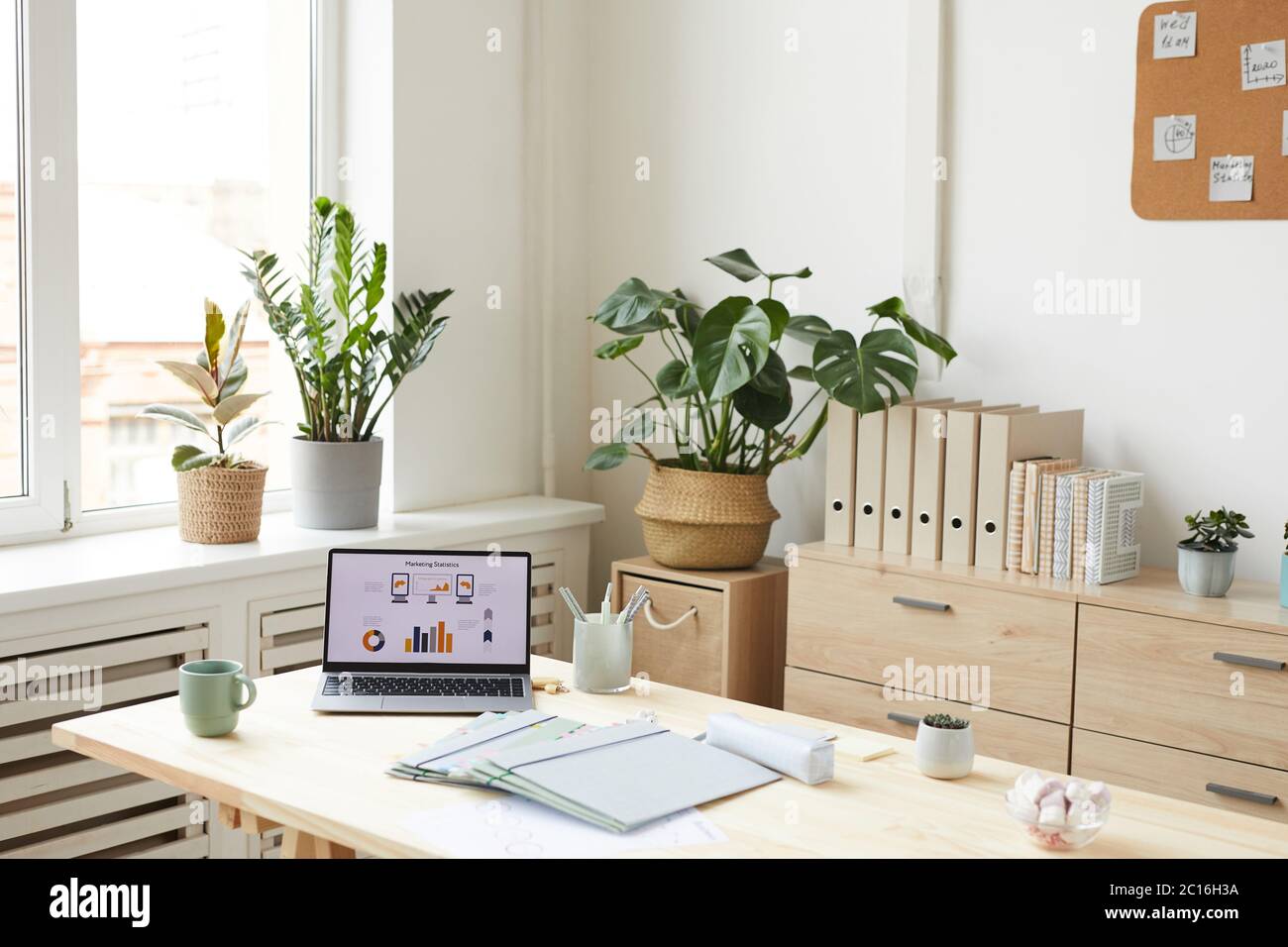 Background image of cozy home office workplace with minimal and natural design, copy space Stock Photo