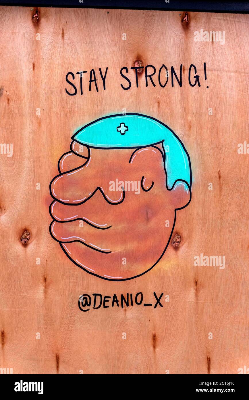 Street art supporting medical staff on hoardings on the front of