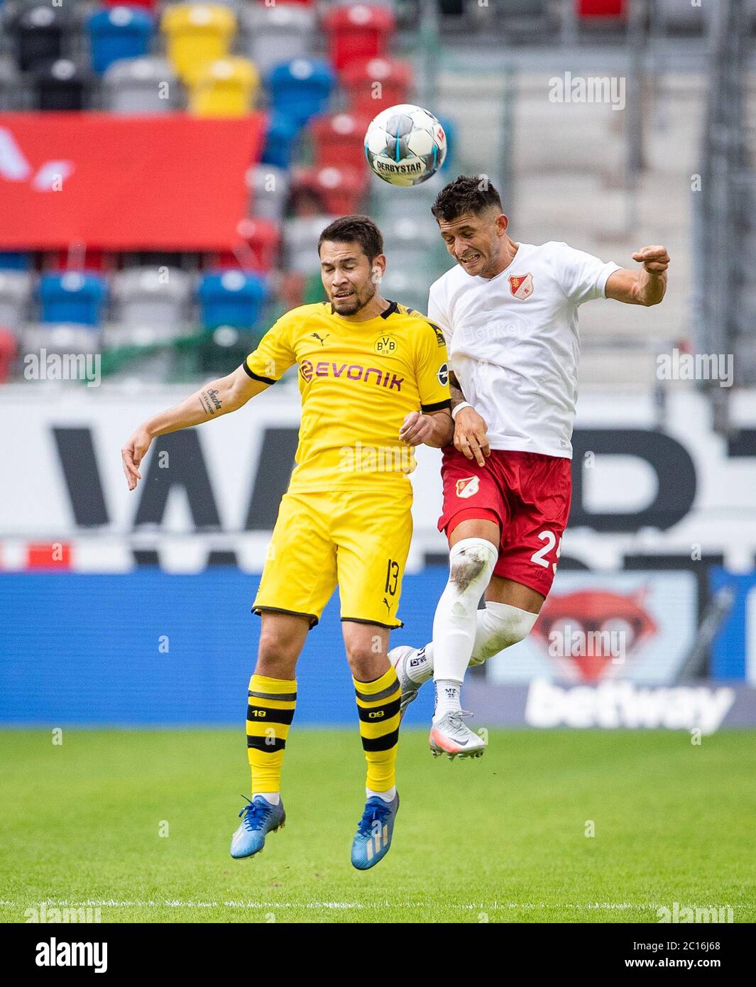 Merkur Spiel Arena Duesseldorf Germany 13.6.2020, Football: Bundesliga season 2019/20 matchday 31  Fortuna Düsseldorf (F95, white) vs Borussia Dortmund (BVB, yellow) 0:1 — Raphael Guerreiro (Borussia Dortmund), Matthias Zimmermann (Fortuna Duesseldorf) Due to the Corona pandemic matches are played in empty stadiums without spectators  Foto:  Moritz Mueller /firosportphoto//POOL/via Kolvenbach       DFL REGULATIONS PROHIBIT ANY USE OF PHOTOGRAPHS AS IMAGE SEQUENCES AND OR QUASI VIDEO     EDITORIAL USE ONLY     NATIONAL AND INTERNATIONAL NEWS AGENCIES OUT c Stock Photo