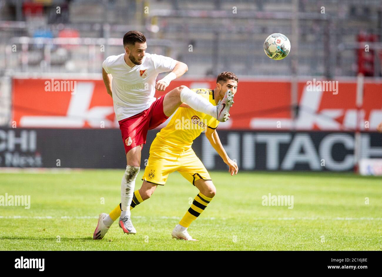 https www alamy com merkur spiel arena duesseldorf germany 1362020 football bundesliga season 201920 matchday 31 fortuna dsseldorf f95 white vs borussia dortmund bvb yellow 01 niko gieelmann f95 achraf hakimi bvb due to the corona pandemic matches are played in empty stadiums without spectators foto moritz mueller firosportphotopoolvia kolvenbach dfl regulations prohibit any use of photographs as image sequences and or quasi video editorial use only national and international news agencies out c image362178446 html