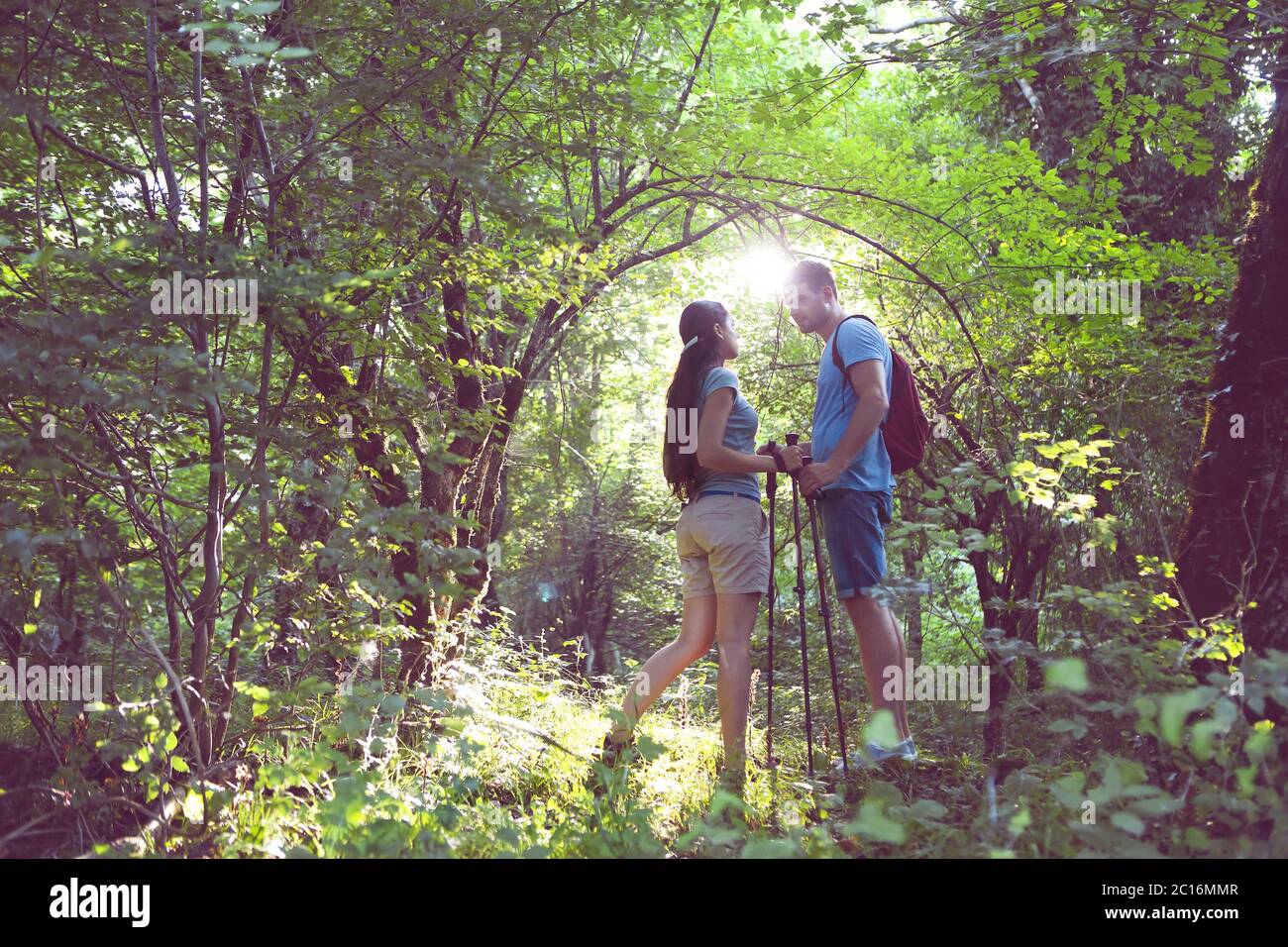 Happy man woman hiking mountains hi-res stock photography and images ...