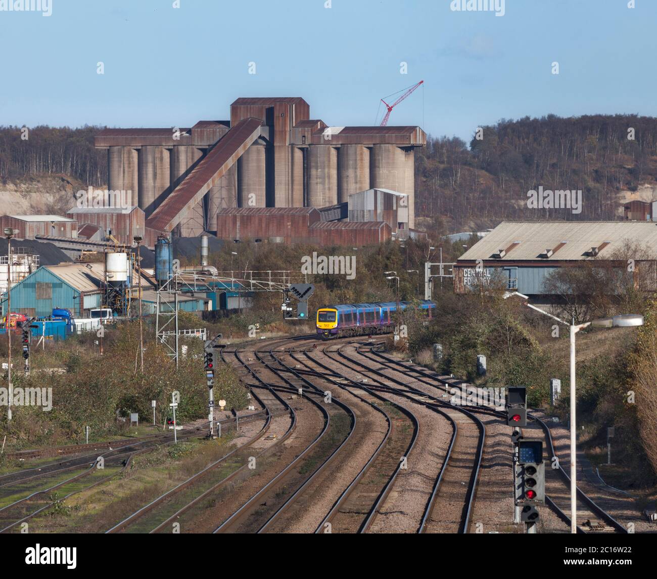 First Transpennine Express class 170 Bombardier Turbostar train passing through Scunthorpe steelworks Stock Photo