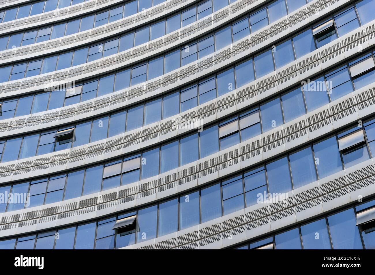 modern office building with glass wall Stock Photo - Alamy