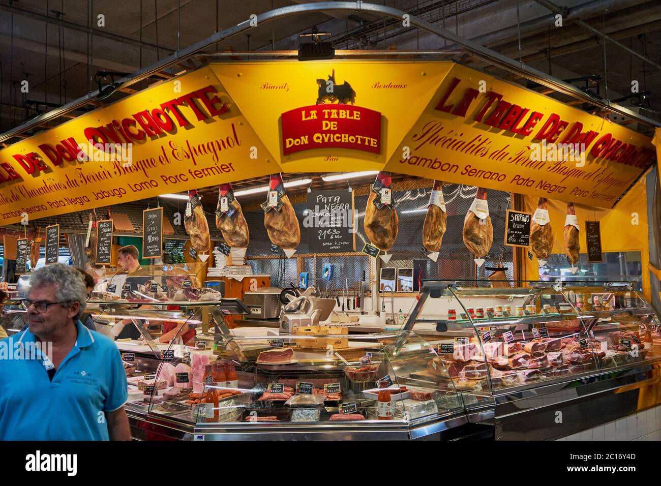 Spanish ham and meat on sale at Don Quixote's table at Capuchin Market ...