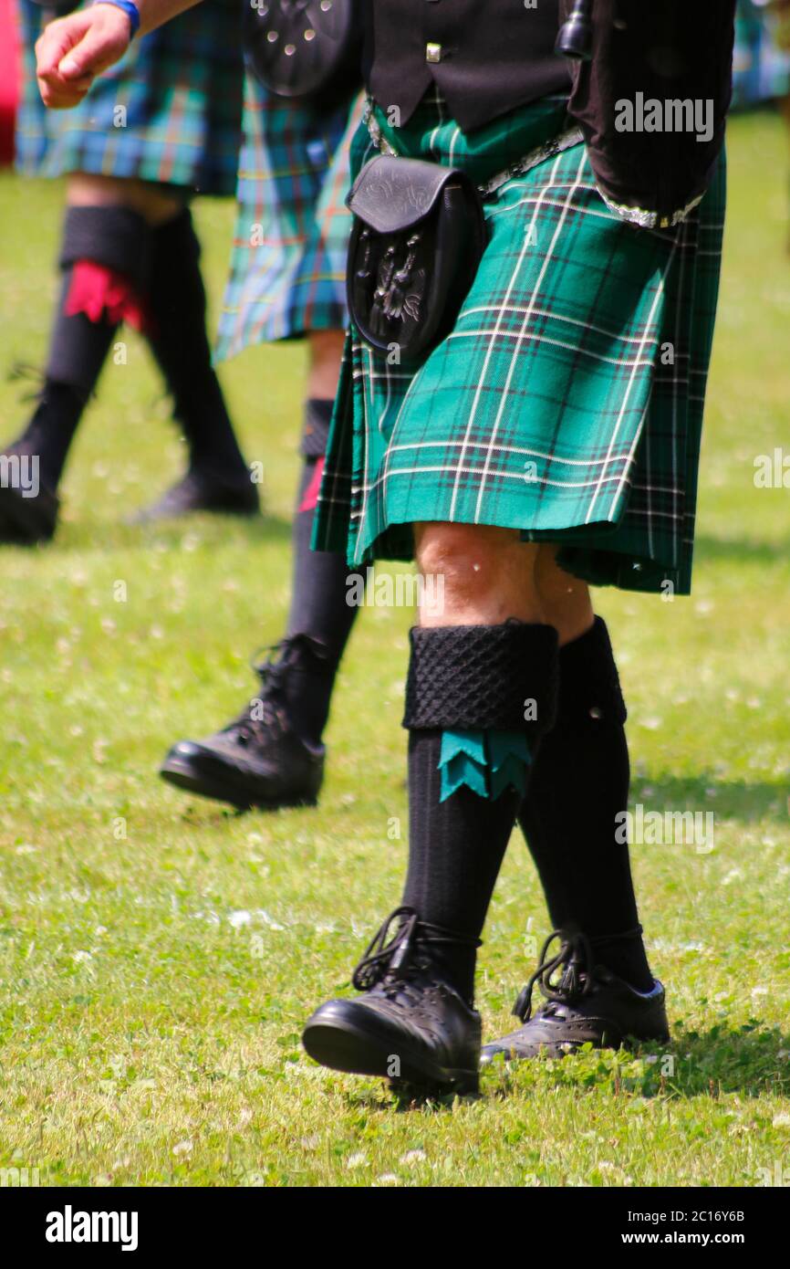 Schottenrock, Kilts mit Sporren getragen Stock Photo