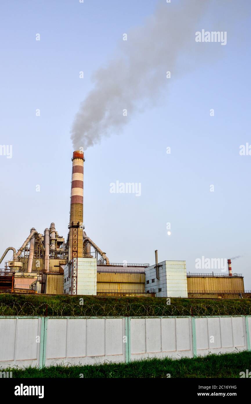 Pollution of atmospheric air from the chimneys of plants Stock Photo
