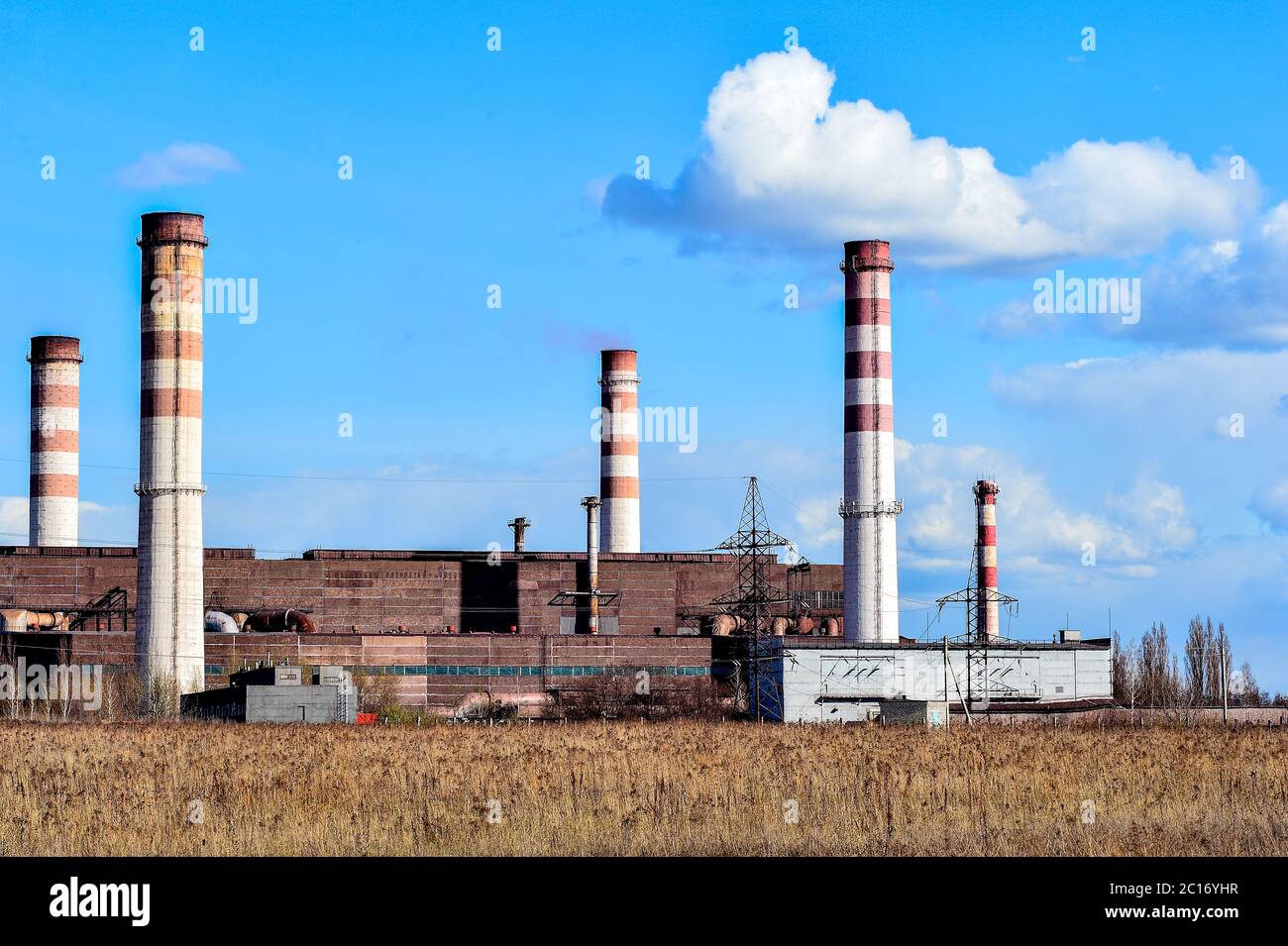 Pollution of atmospheric air from the chimneys of plants Stock Photo