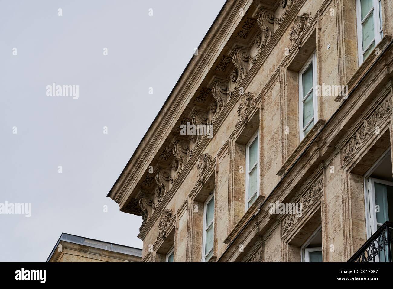 Rooflines and windows in and around Place de la Bourse in Bordeaux, France Stock Photo