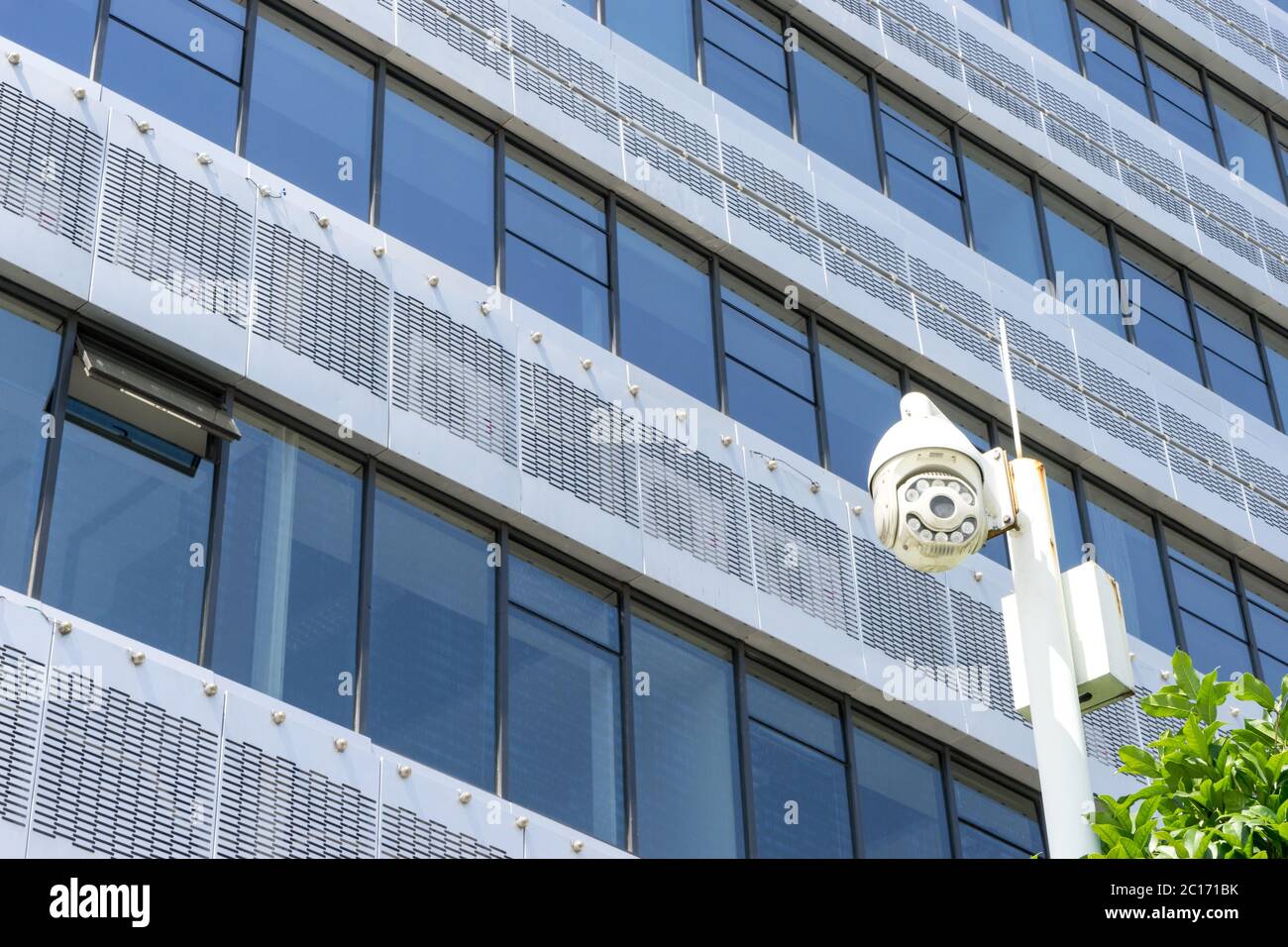 modern office building with glass wall Stock Photo - Alamy