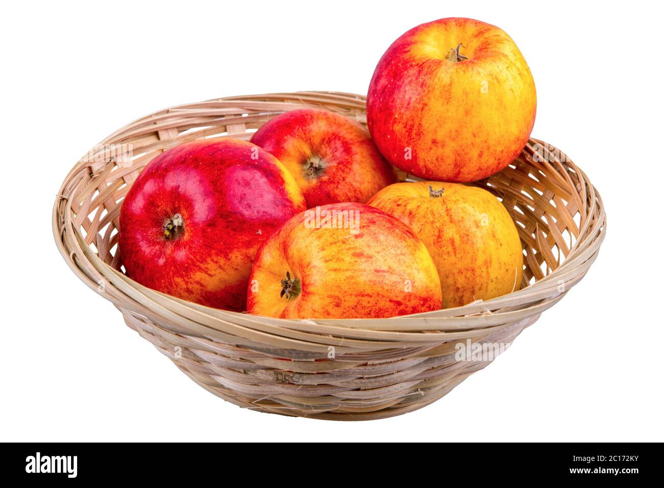 Wicker basket with apples isolated on a white background Stock Photo ...
