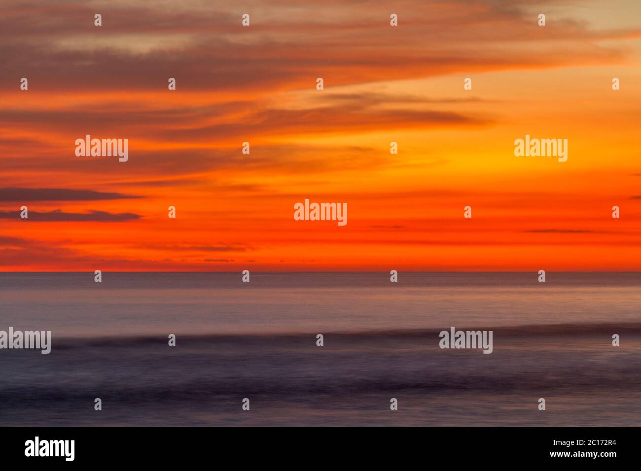 Soft and moody sunset over the ocean on the Nicoya Peninsula, Costa Rica - Stock Image