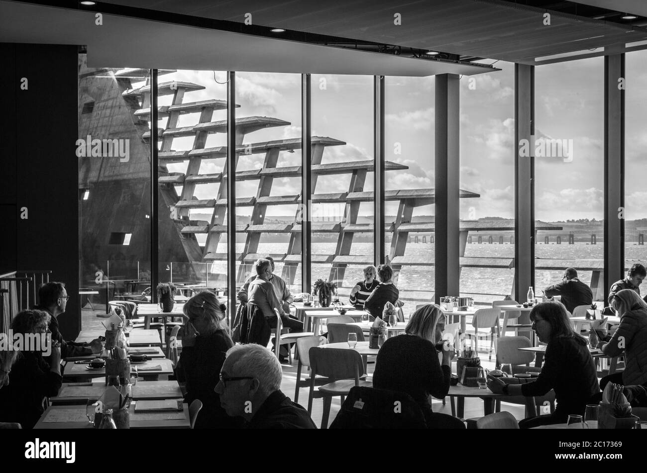 Monochrome (black and white) image of the restaurant in the V&A Dundee Building, Dundee, Scotland, United Kingdom. Stock Photo