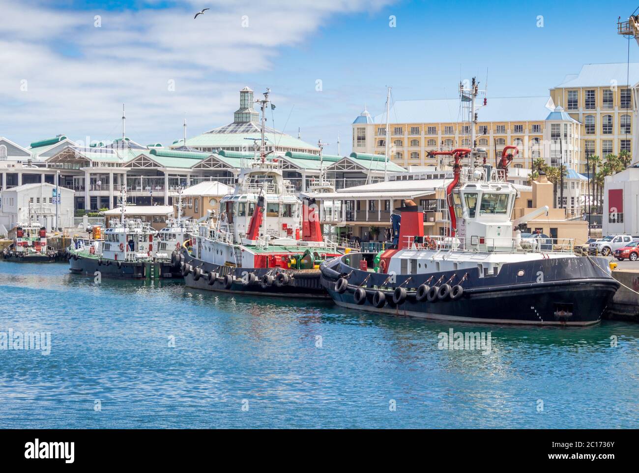 Victoria and Alfred Waterfront and harbour in Cape Town and tug boats Stock Photo