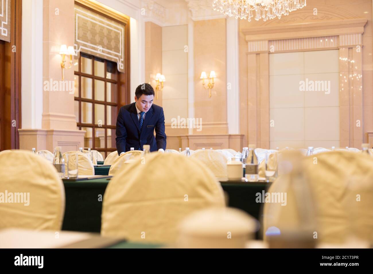 young man in modern dining room Stock Photo