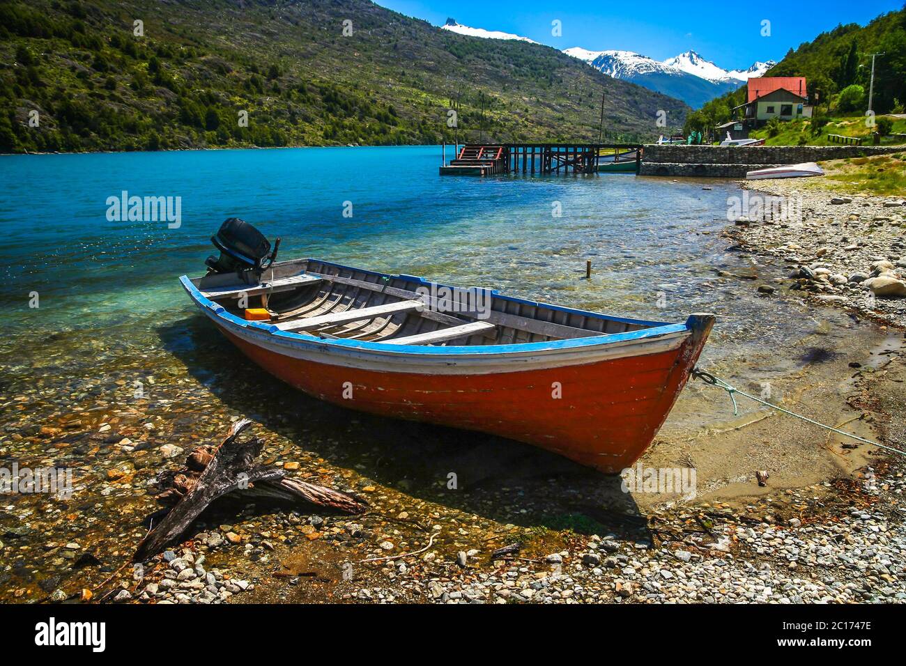 Small boat on Patagonian lakeshore Stock Photo Alamy