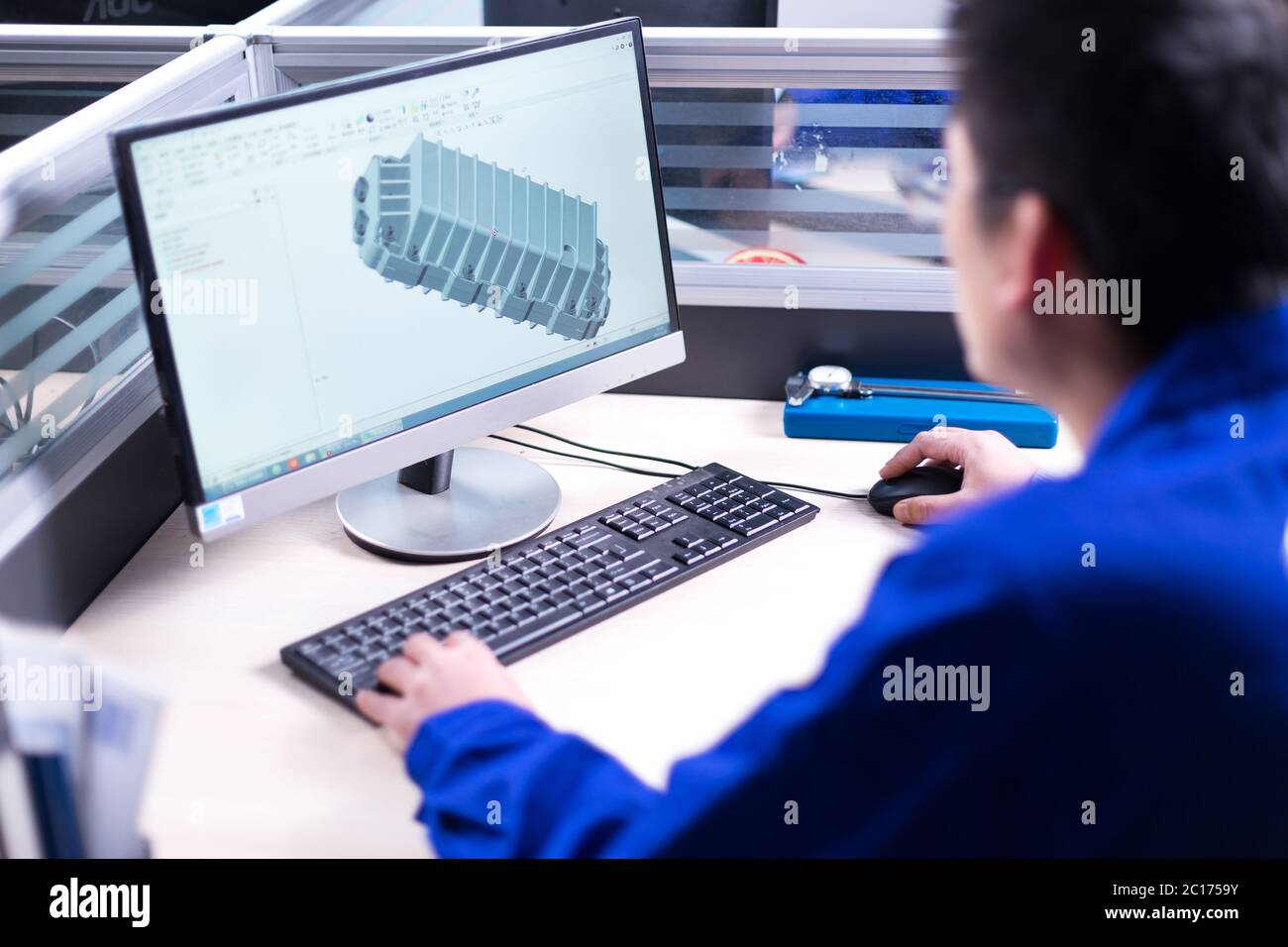 young man makes drawings on computer Stock Photo