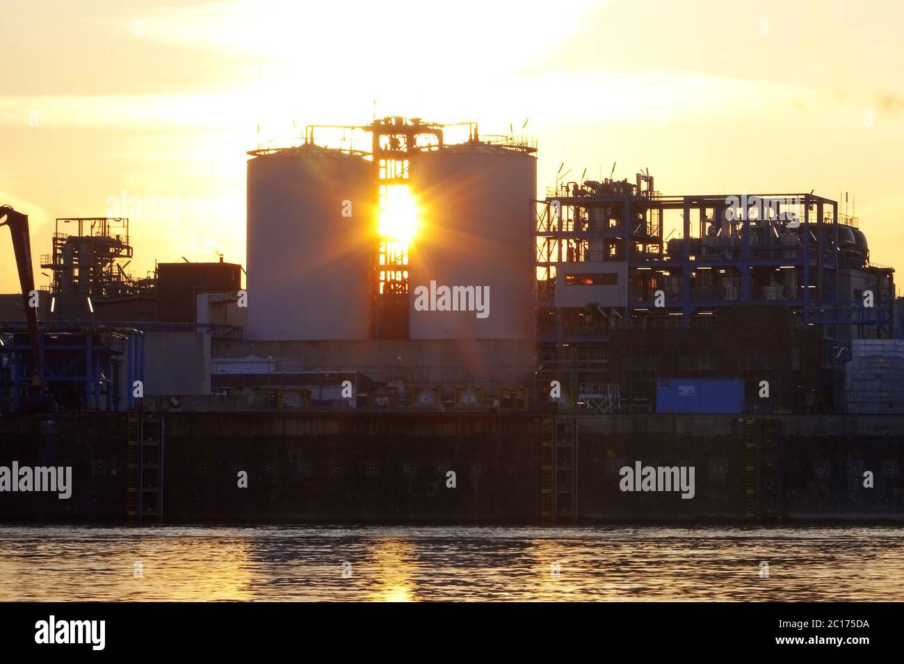 Bayer AG chemical plant on the Rhine riverbank at sunrise, Leverkusen, Germany, Europe Stock Photo