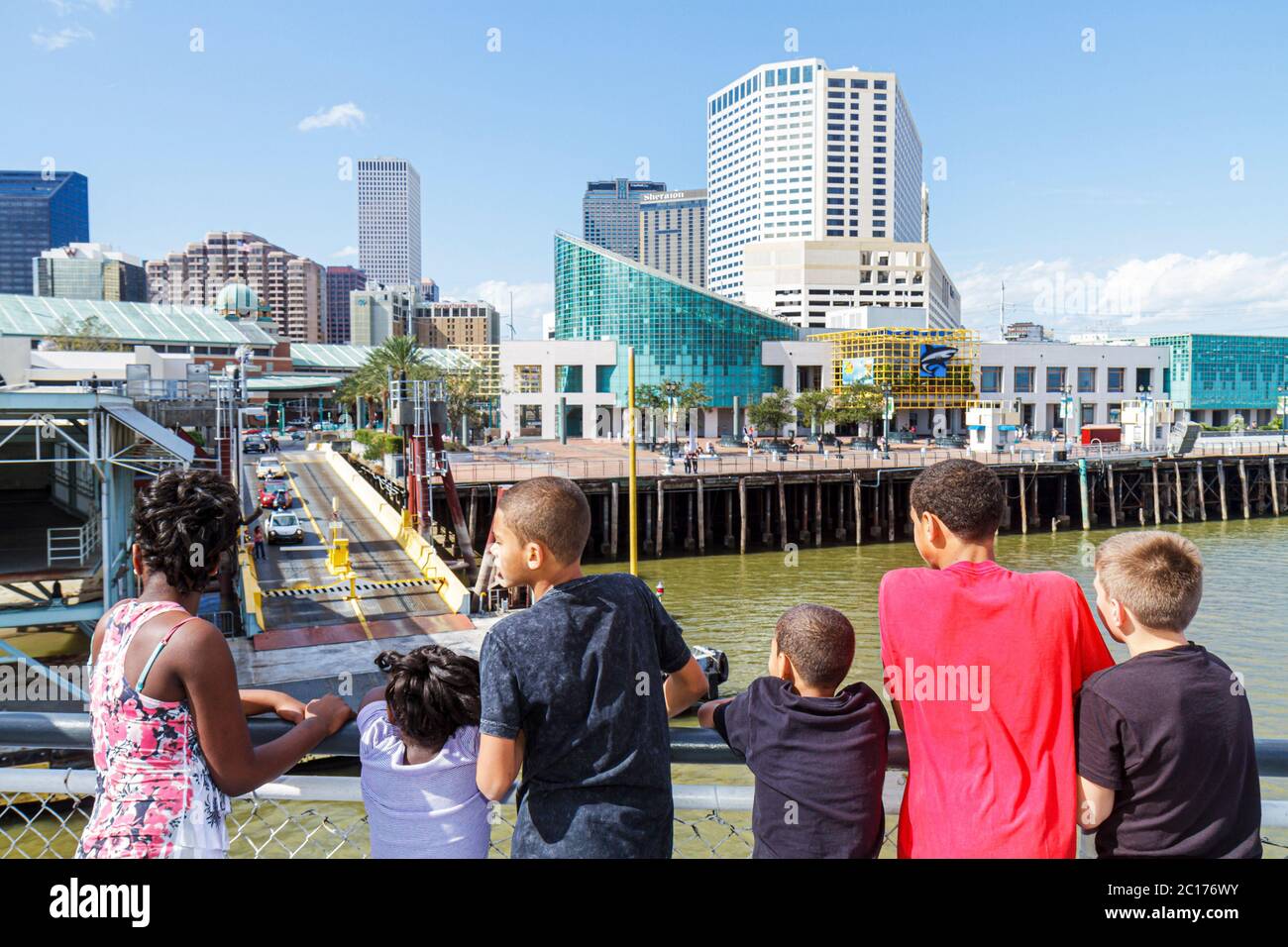 New Orleans Louisiana,Mississippi River water,Algiers Ferry,CCCD,Canal Street,ferryboat,navigation,public transportation,car cars ferry,inflight,passe Stock Photo