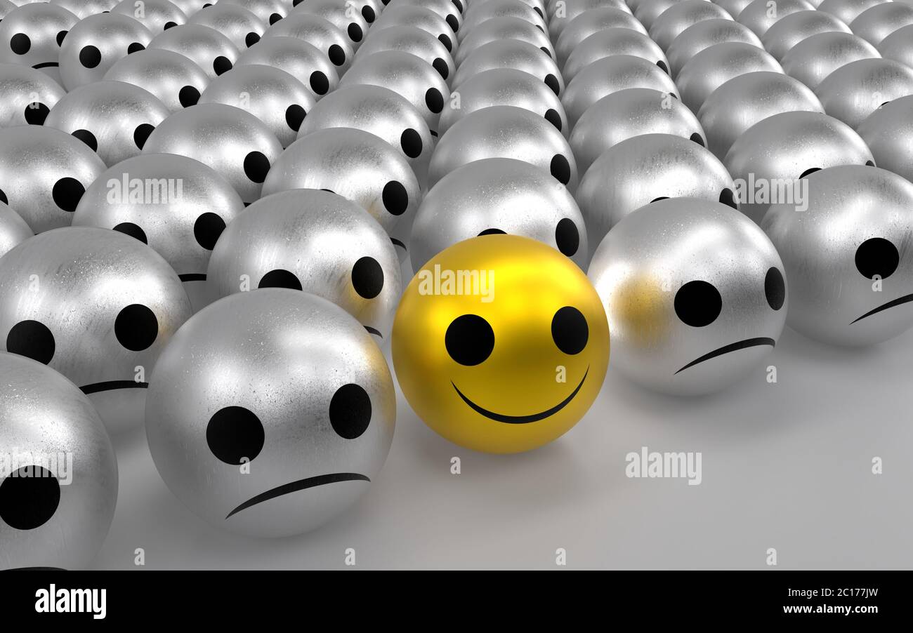 Yellow ball with happy face among so many silver sadness balls. Stock Photo