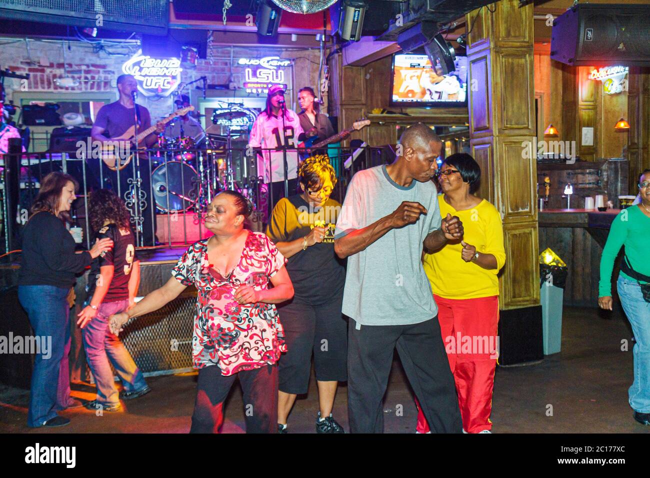 New Orleans Louisiana,French Quarter,Bourbon Street,bar bars lounge pub,club,live music,entertainment,night nightlife eveningclub,musician,stage,perfo Stock Photo