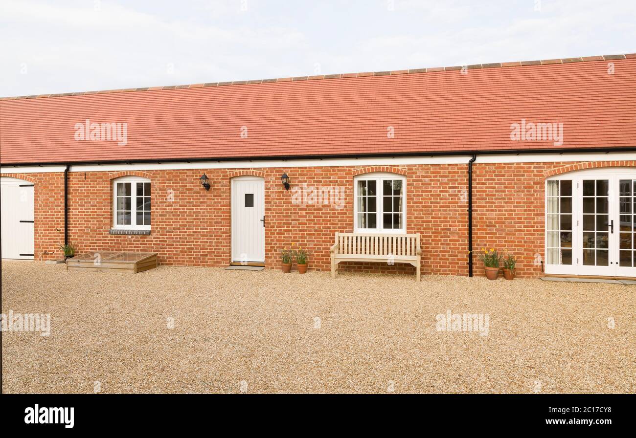Barn conversion to provide a single storey granny annexe, annex. UK house exterior Stock Photo