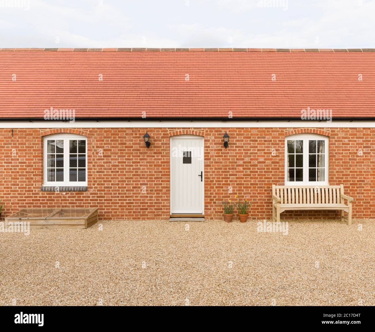 Single storey (story) new build house or granny annexe (annex), part of a UK home extension Stock Photo