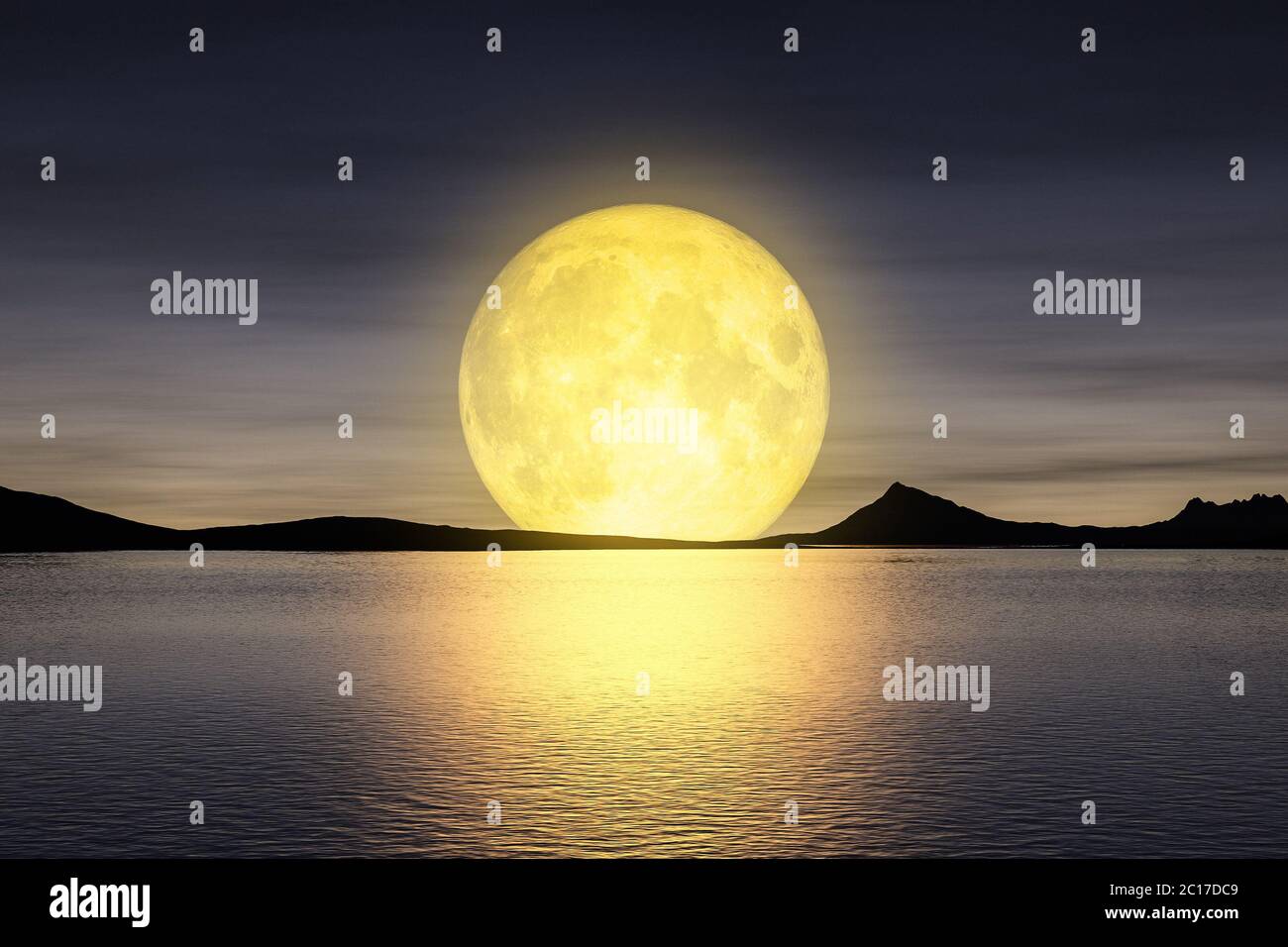 moon rising over the sey Stock Photo