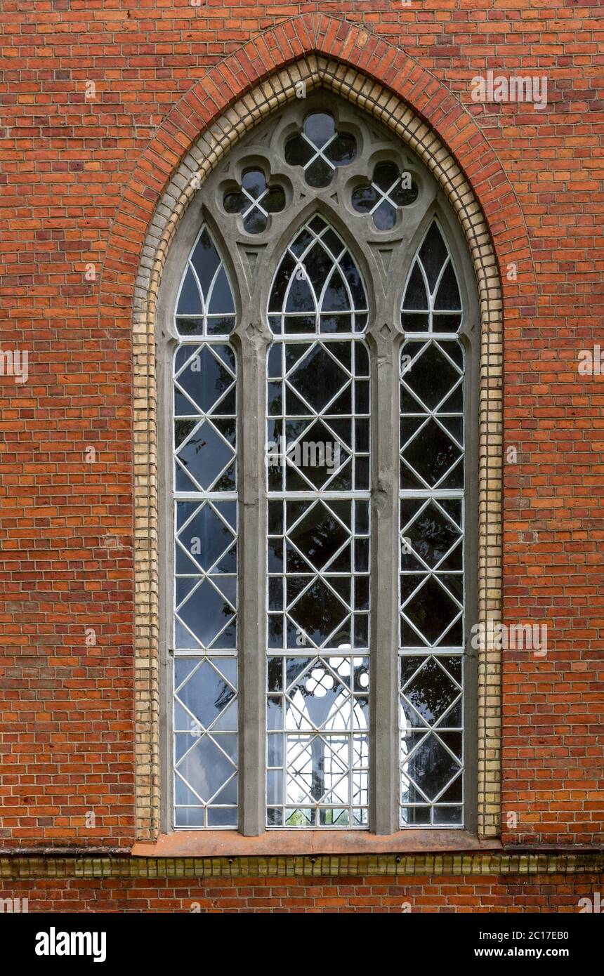 The old window in the red brick wall Stock Photo - Alamy