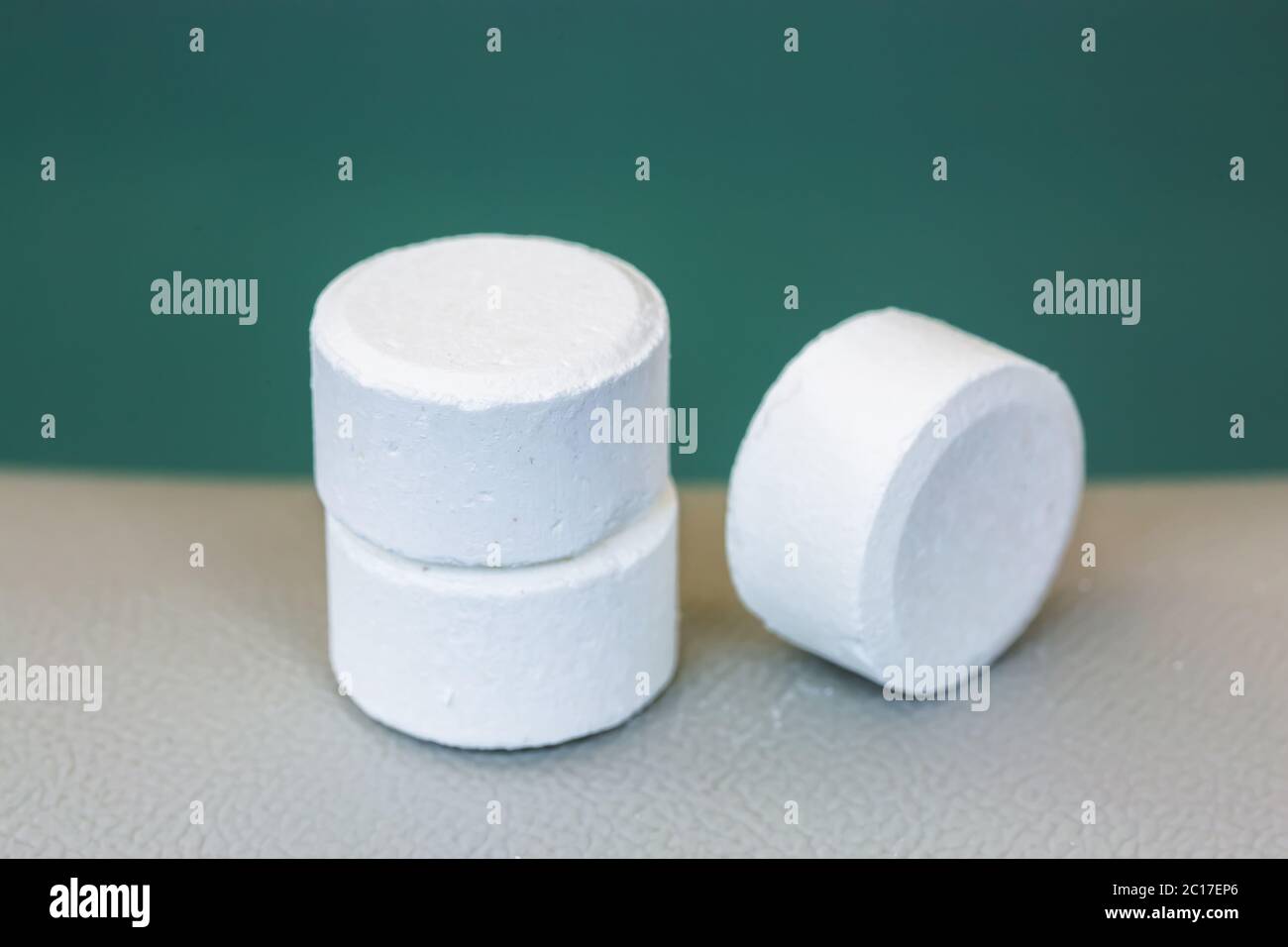 tablet of chlorine or bromide for mainteance of water quality of jacuzzi or spa Stock Photo