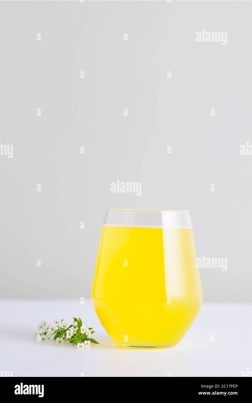 Glass of fresh homemade tasty  lemonade.Detox drink. Vertical,with copy space. Stock Photo
