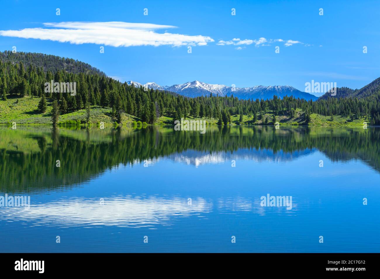 hidden lake in the gravelly range and distant peaks of the madison
