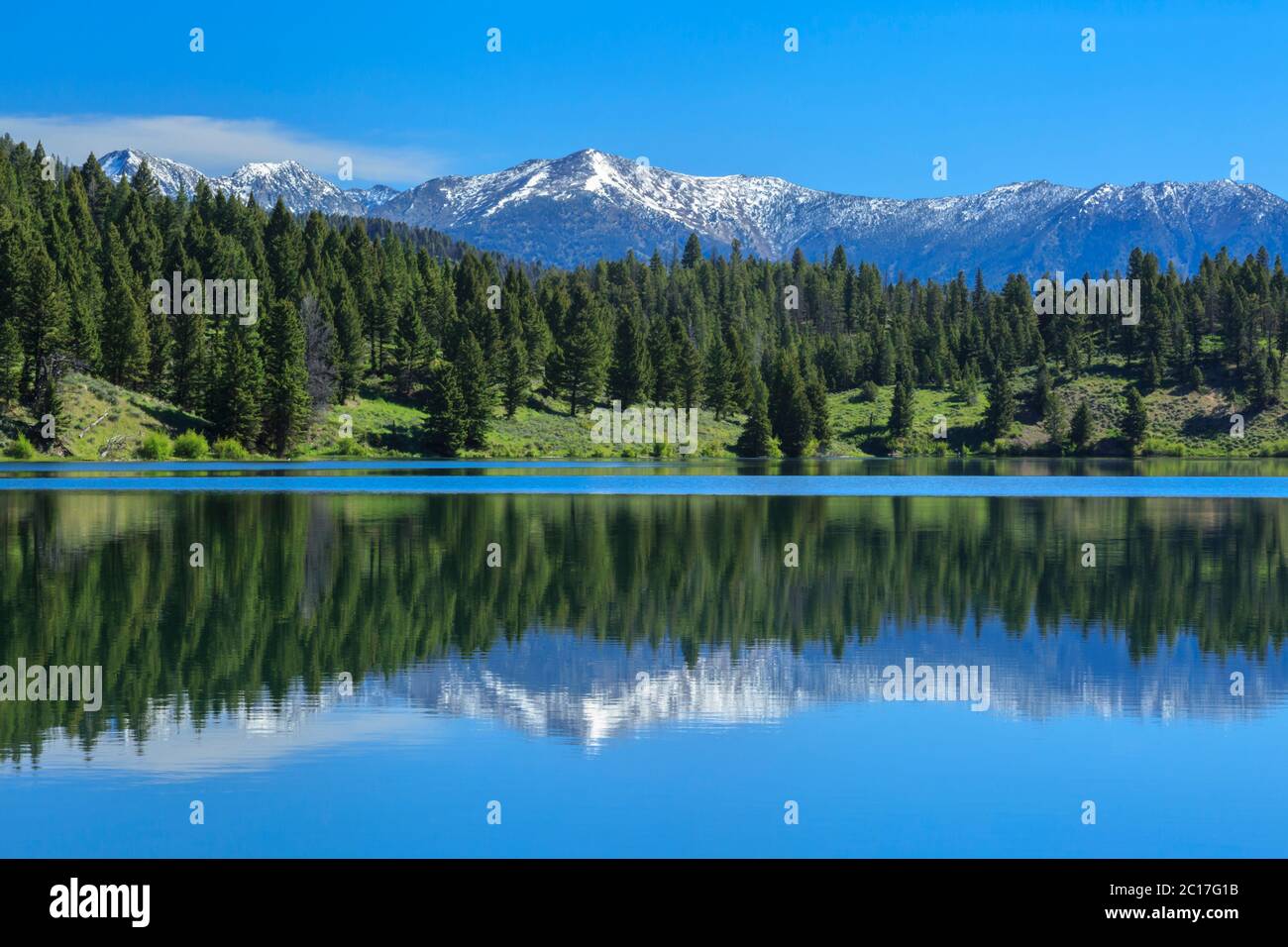 hidden lake in the gravelly range and distant peaks of the madison
