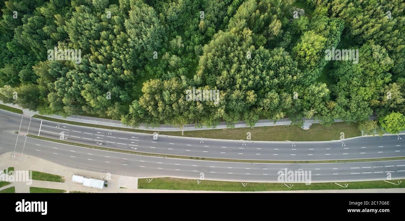 Empty road with many lines in city above top drone view Stock Photo