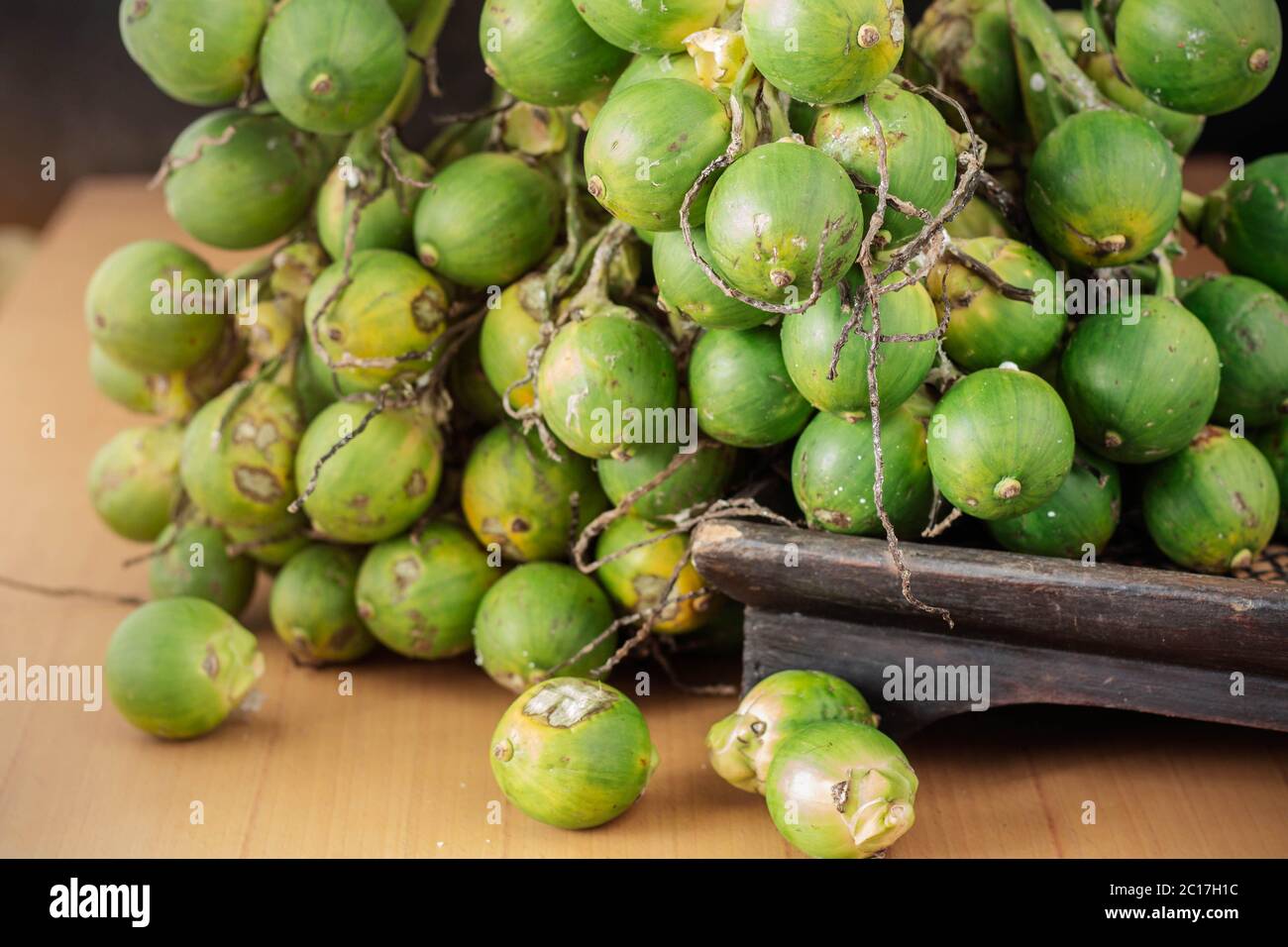 betel nut on wooden Stock Photo