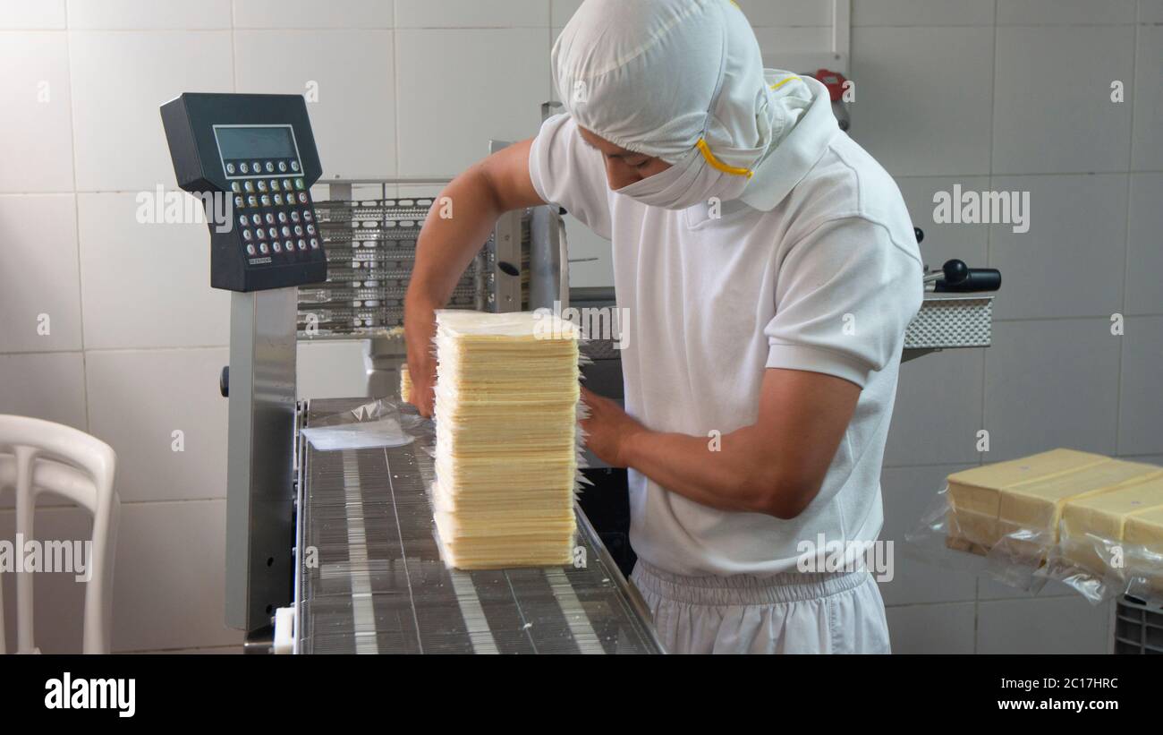 Packaging Labore Man packing equipment hi-res stock photography and images - Alamy