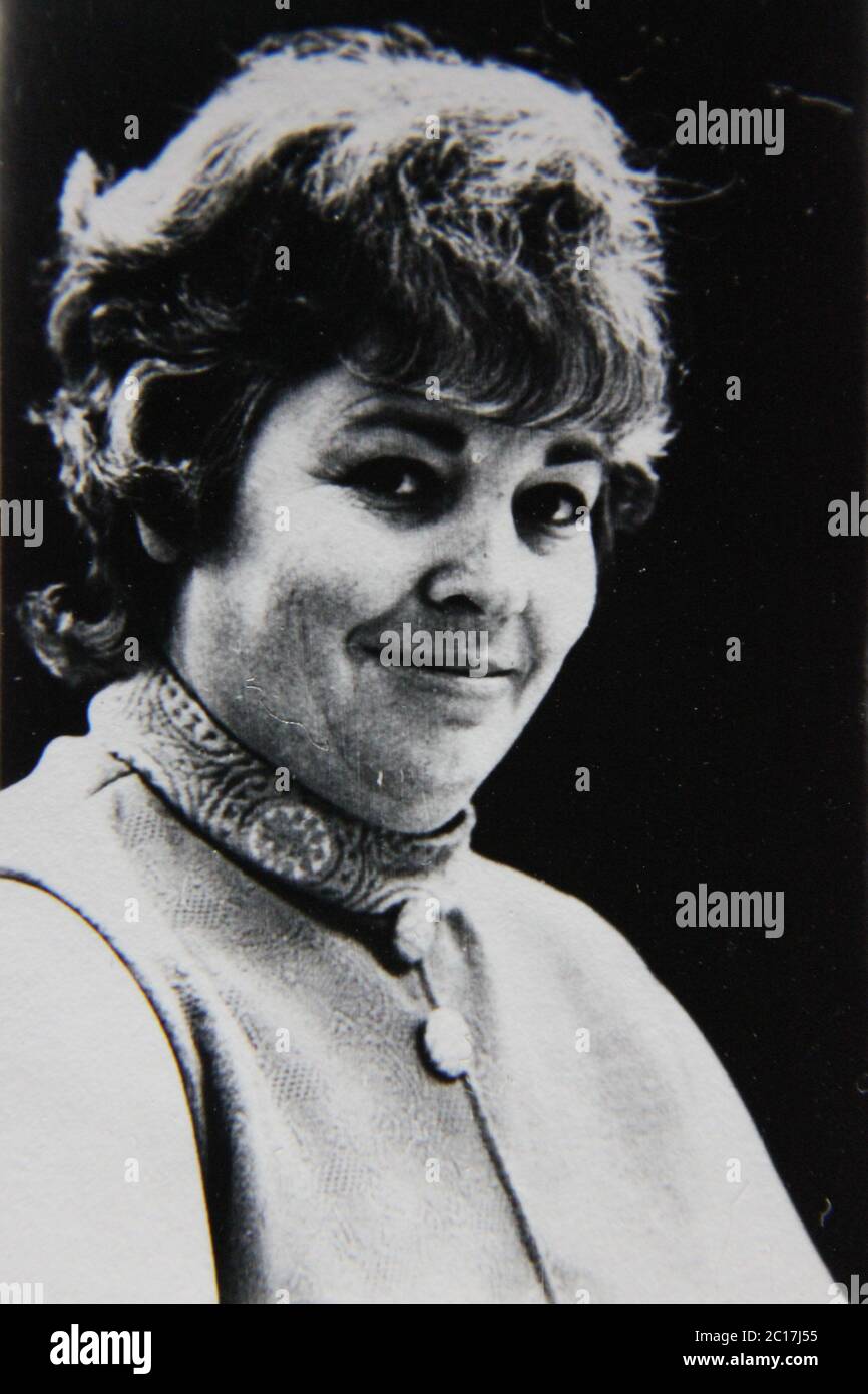 Fine 70s vintage black and white extreme photography of a happy fortysomething woman smiling. Stock Photo