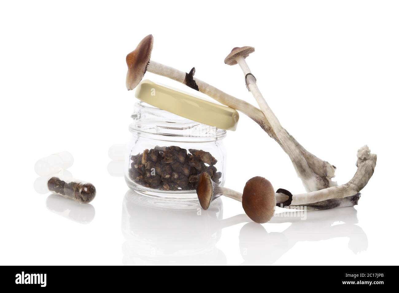 Dried Magic mushrooms in glass jar Stock Photo