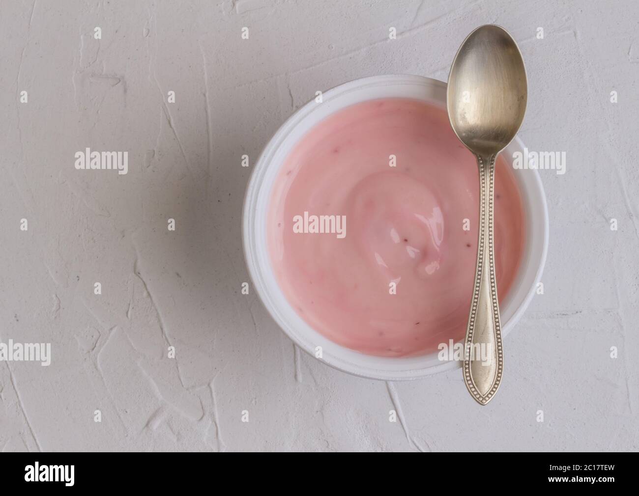 Healthy strawberry fruit flavored yogurt with natural coloring in