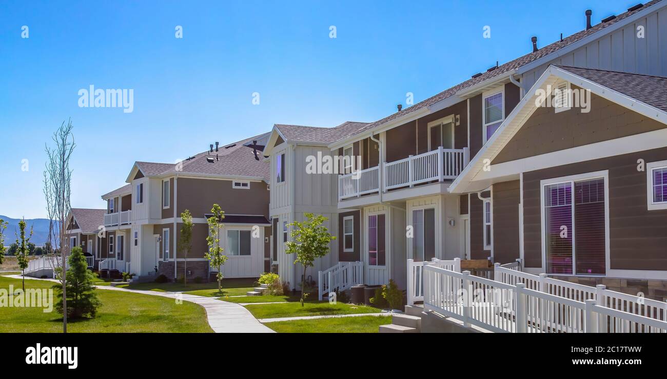 Scenic residential neighborhood in Daybreak Utah with mountain and sky ...