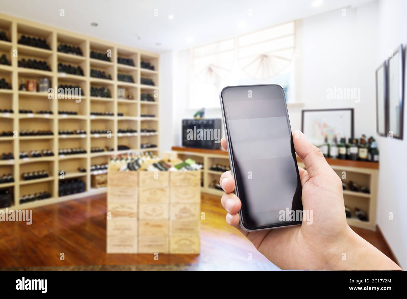 mobile phone in modern wine cellar Stock Photo Alamy