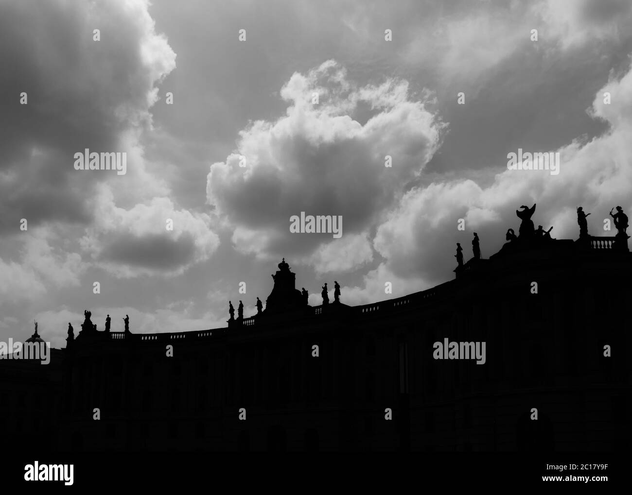 Berlin, Germany - June 2019: Black And White Photo From Below Of Humboldt University Roof Statues. Stock Photo