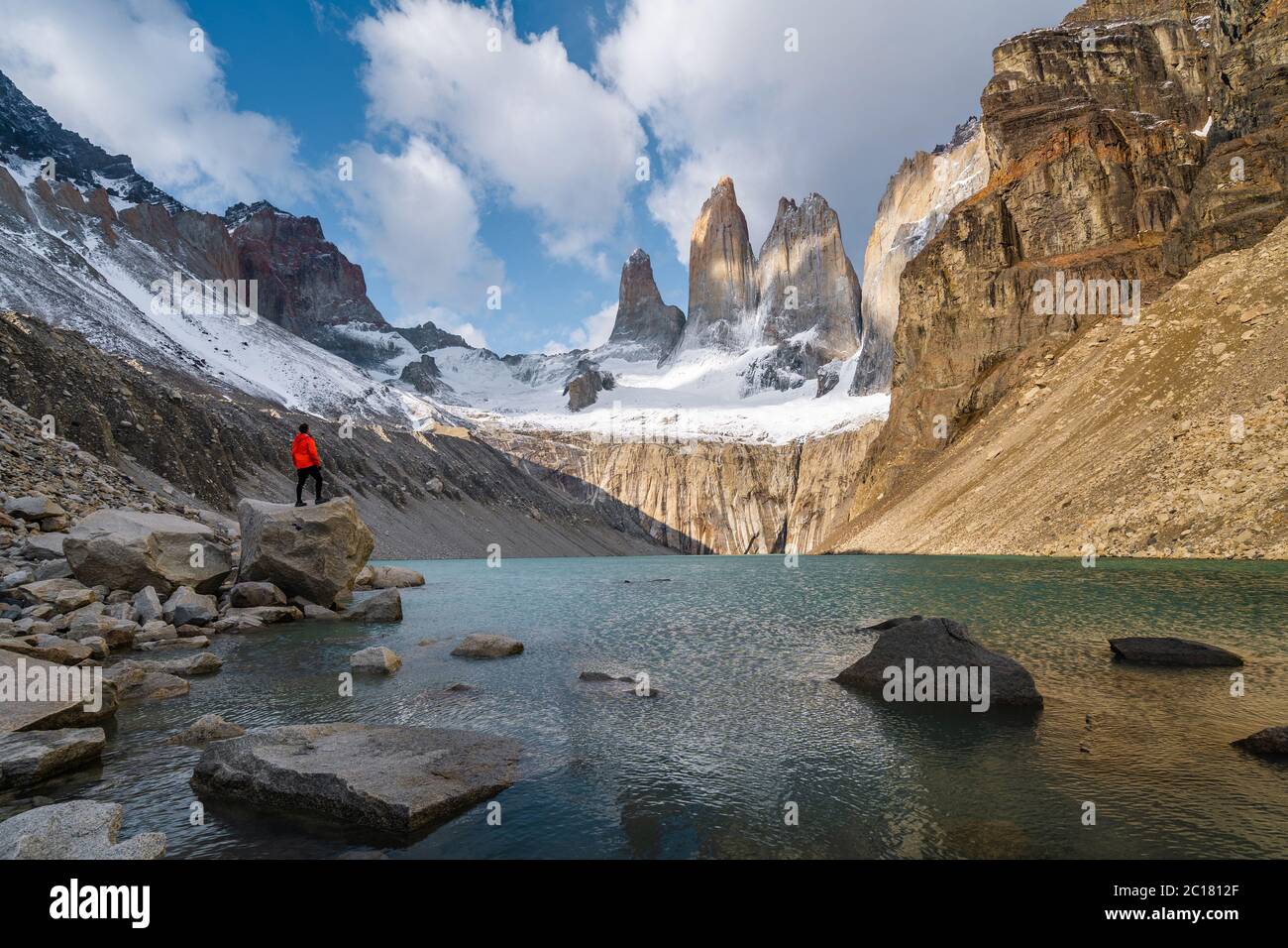 Hiker at Mirador Las Torres in Torres del Paine National Park, Chile, Patagonia, South America. Stock Photo