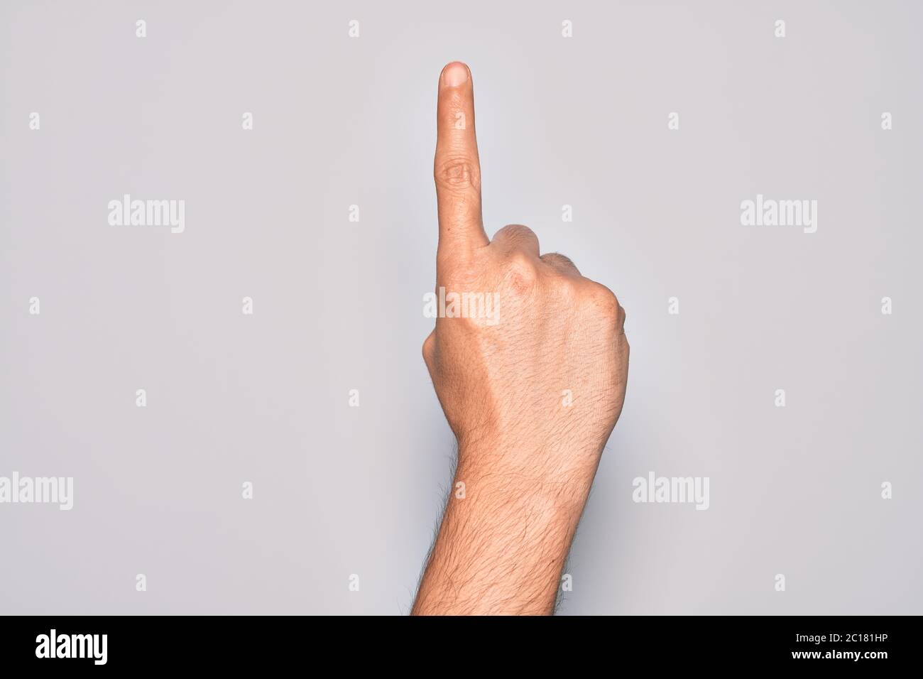 Hand of caucasian young man showing fingers over isolated white ...