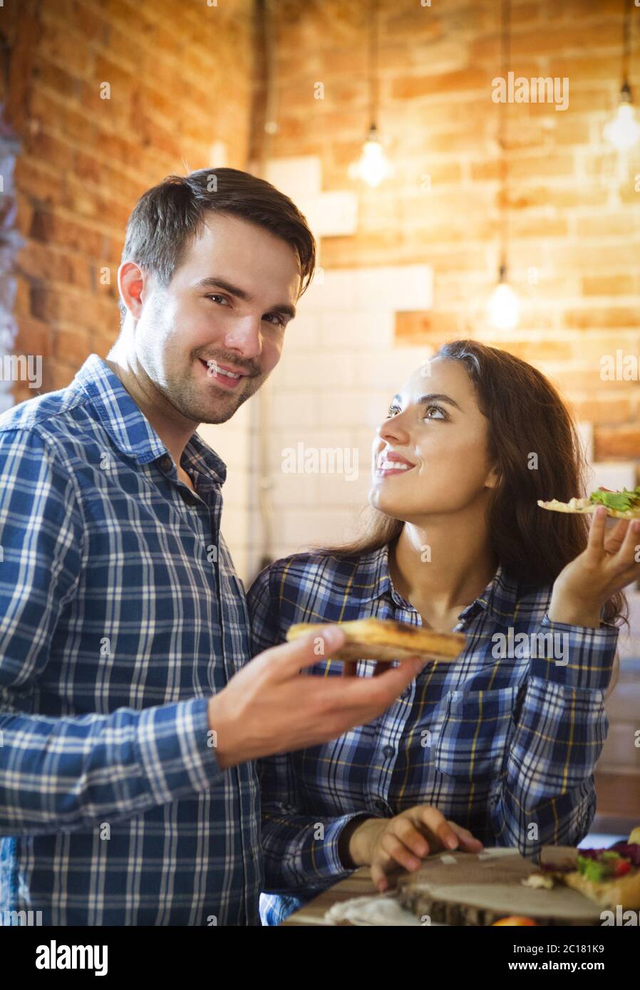Woman eating man cooking hi-res stock photography and images - Alamy
