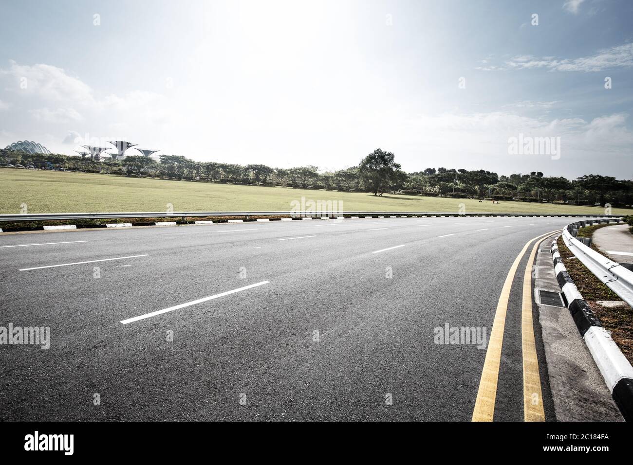 Empty road green meadow hi-res stock photography and images - Alamy
