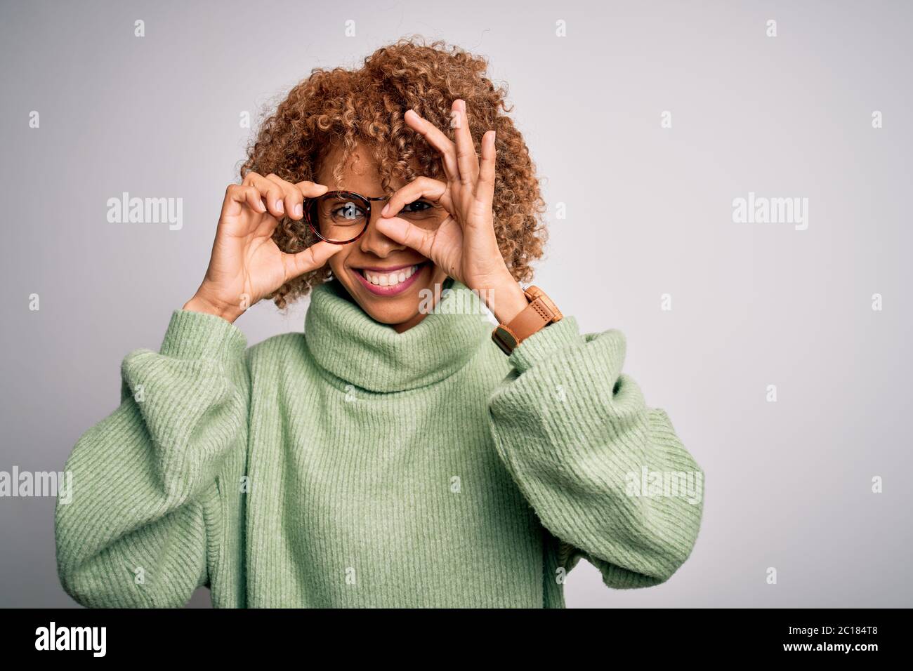 African american optical woman with curly hair wearing glasses over ...
